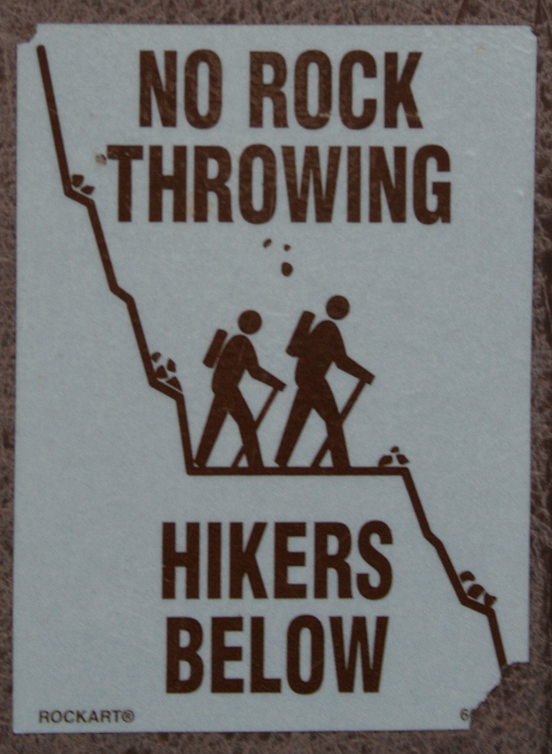 no rock throwing, hikers below